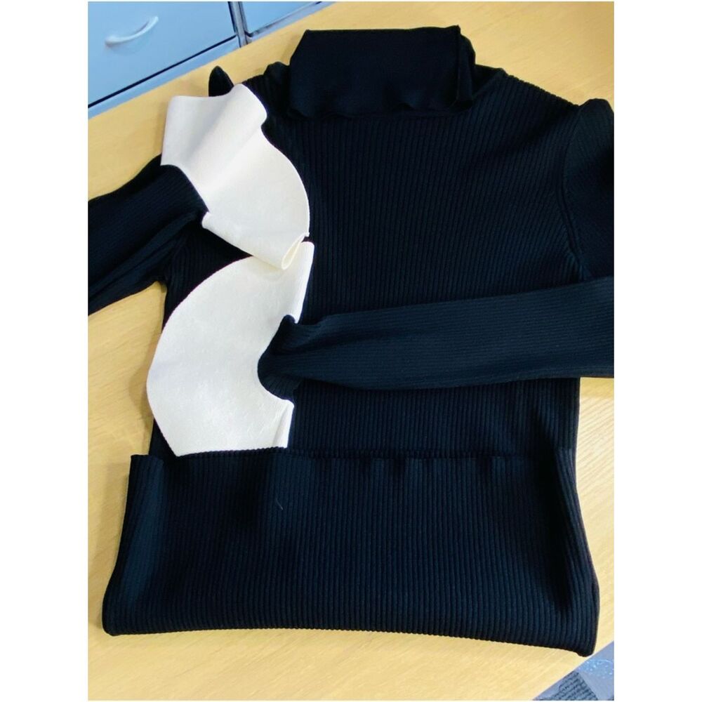 Valentino Garavani Black Ribbed Turtleneck with Flounced Sleeves. Authentic SZ M